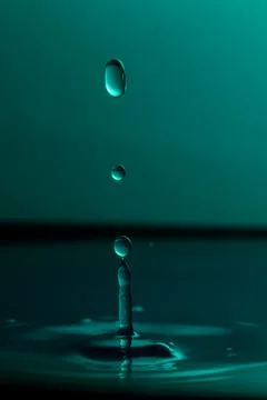 Droplet collision Stock Photos