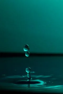 Droplet collision Stock Photos