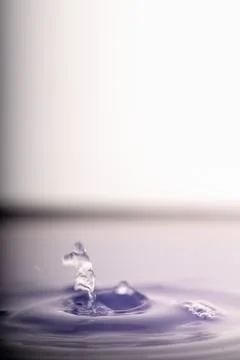 Droplet collision Stock Photos