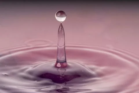 Droplet collision Stock Photos