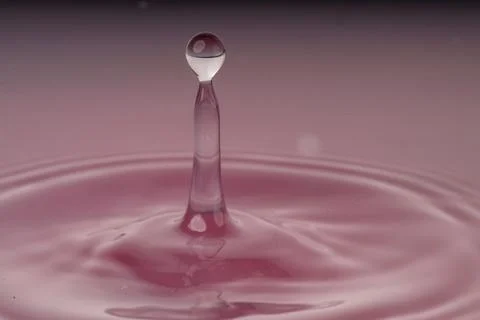 Droplet collision Stock Photos