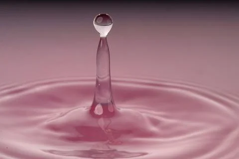 Droplet collision Stock Photos