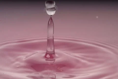 Droplet collision Stock Photos
