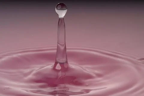 Droplet collision Stock Photos