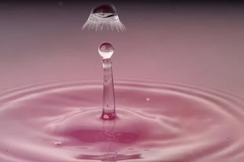 Droplet collision Stock Photos