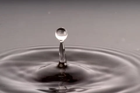 Droplet collision Stock Photos