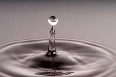 Droplet collision Stock Photos