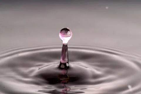 Droplet collision Stock Photos