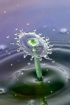 Droplet collision Stock Photos