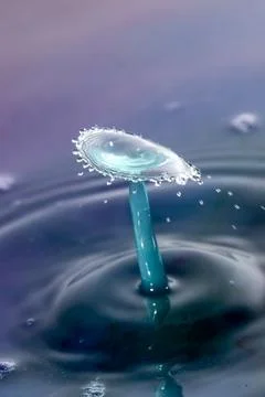 Droplet collision Stock Photos