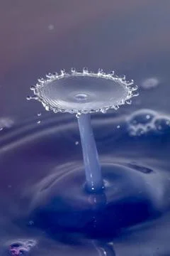 Droplet collision Stock Photos
