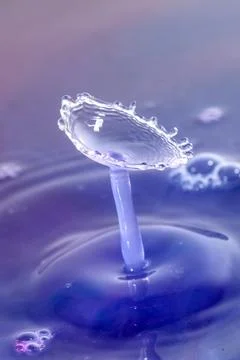 Droplet collision Stock Photos
