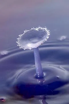 Droplet collision Stock Photos
