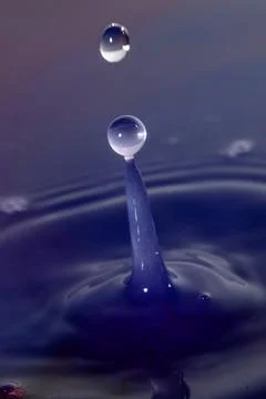Droplet collision Stock Photos