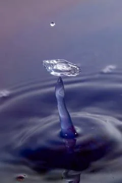 Droplet collision Stock Photos