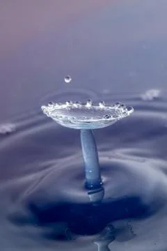 Droplet collision Stock Photos