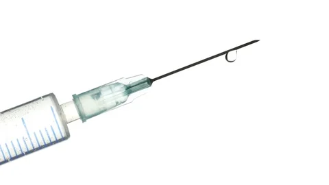 The droplet drips from the tip of the needle. Closeup Stock Footage 84832043
