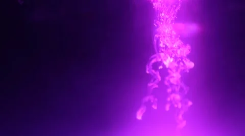 Droplets Drizzle Downward in a Purple Cloud Tank Stock Footage 62578976