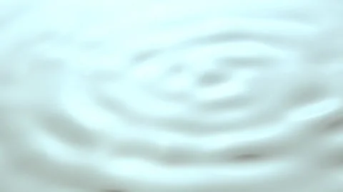 Droplets make rings on water and last tiny bubbles Stock Footage 231217214
