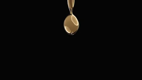 Droplets of oil falling. Slow Motion. Stock Footage 86573886