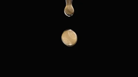 Droplets of oil falling. Slow Motion. Isolated with alpha matte. Stock Footage 86573969