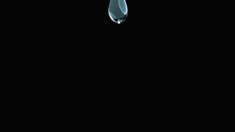 Droplets of pure liquid falling. Slow Motion. Isolated with alpha matte Stock Footage 86824867