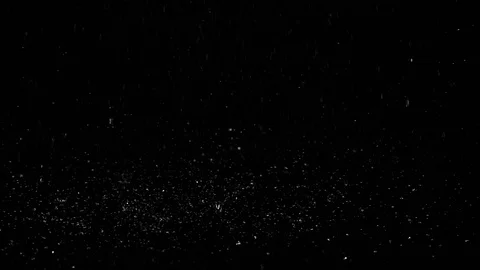 Droplets of rain falling in slow motion on the surface creating splashes Video stock 126203531