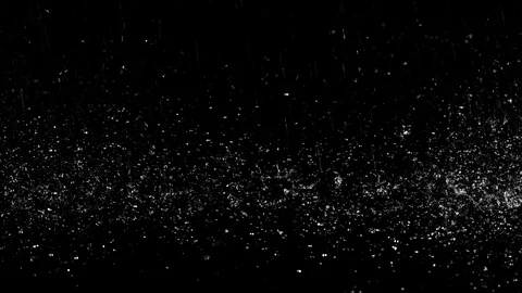 Droplets of rain falling on the surface creating splashes on background Stock Footage 126164405