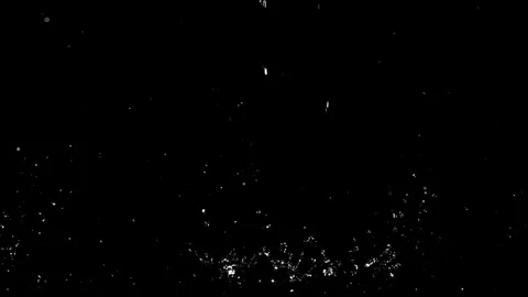 Droplets of rain falling on the surface creating splashes on background Stock Footage 126203696