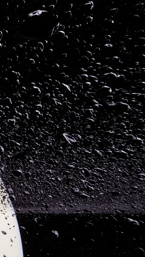 Droplets on surface create texture against black background in space scene Stock Footage 341051850