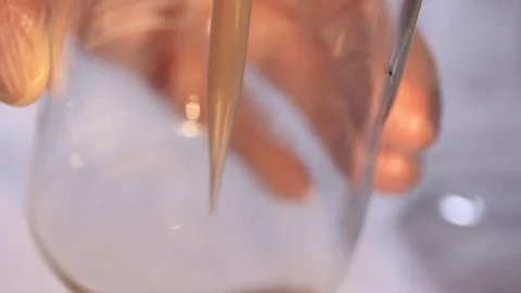 Droplets in test tubes Stock Footage 77046818