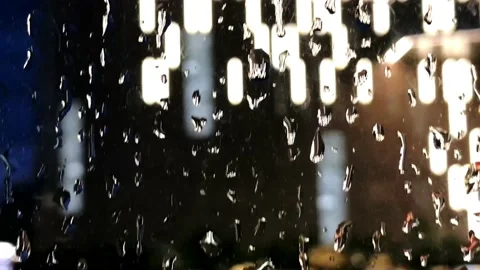 Droplets on transparent surface with blurry background Stock Footage 196134075