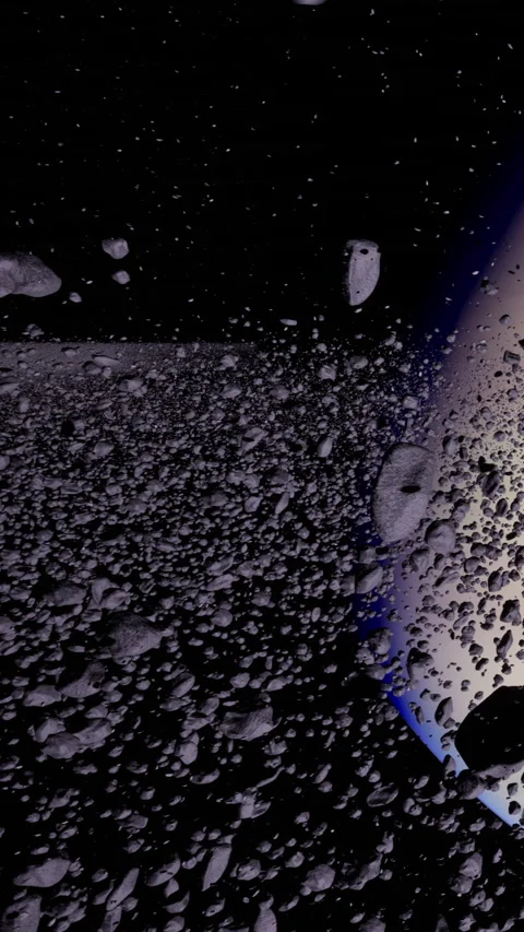 Droplets of water scatter in a dark space with a hint of light Stock Footage 339769537