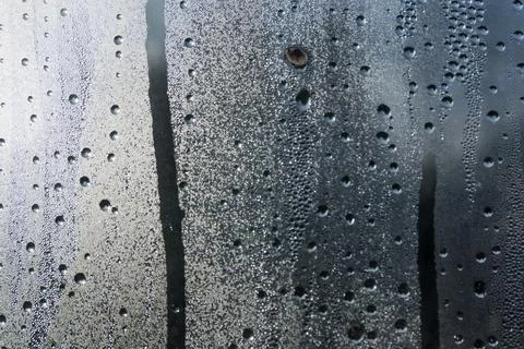 Droplets of water on a window. Stock Photos