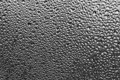 Droplets on the window macro texture Stock Photos