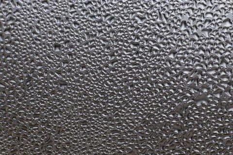 Droplets on the window macro texture Stock Photos