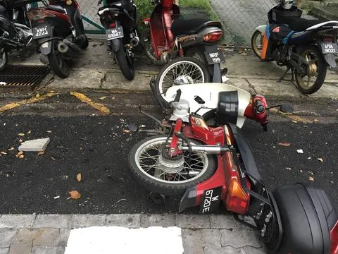 Dropped motorcycle Stockfoto's