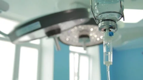 Dropper against the background of the operating light Stock Footage 55671853