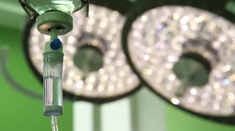 Dropper against the background of the operating light Stock Footage 55671960