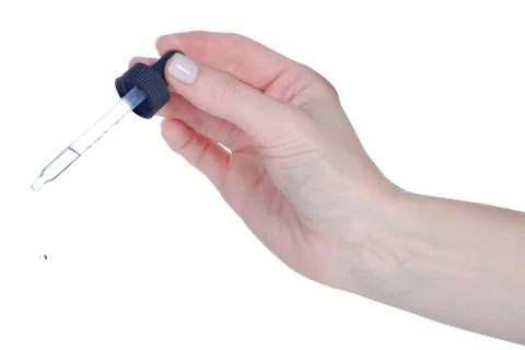 Dropper in hand Stock Photos