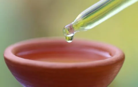 Dropper with pottery Stock Photos