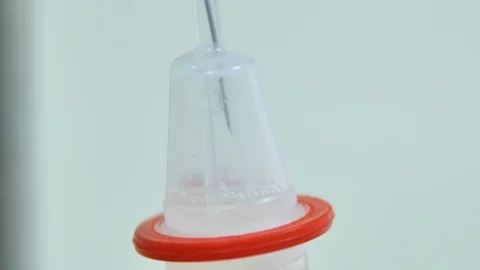 A dropper on a rack is suspended Stockbeeldmateriaal 123176634