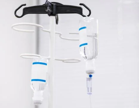 Dropper with saline solution Stock Photos