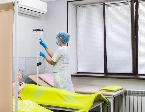 Dropper with saline solution Stock Photos