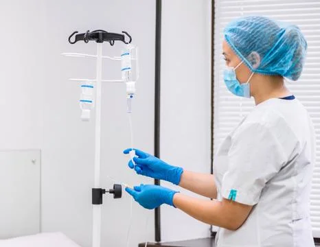 Dropper with saline solution Stock Photos