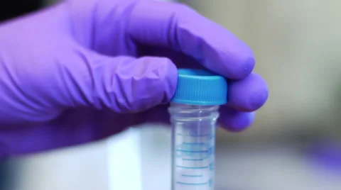 Dropper taking fluid from a test tube Stock Footage 41071073