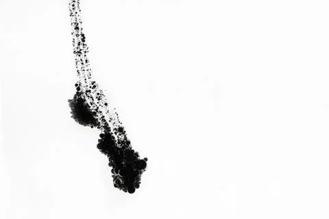 Dropping black bubbles Stock Photos