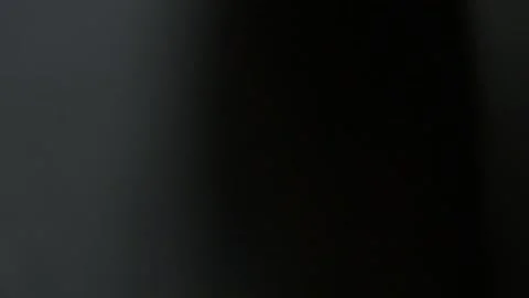 Dropping Black Fabric Mask In Bin Slow Motion Stock Footage 157171130