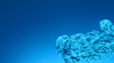 Dropping blue ink in water, Slow Motion Stock Footage 31819583