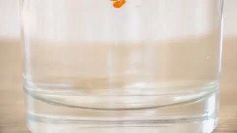 Dropping chemical liquid in test tubes. Close up of working with chemical reagen Stock Footage 96196457